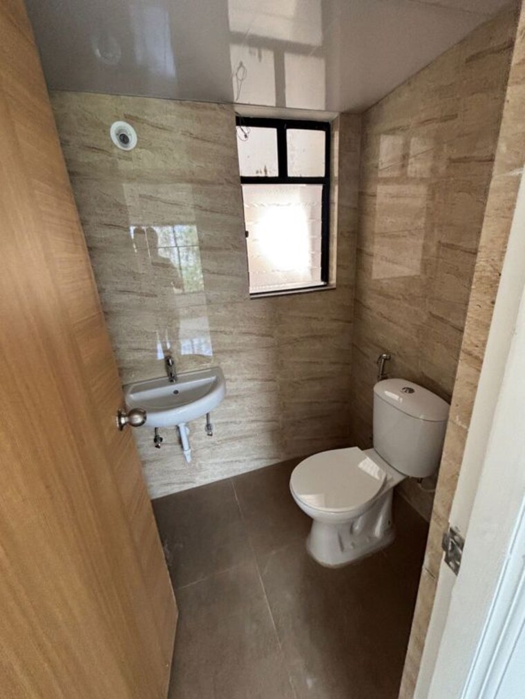 Bathroom, kumar-palaash-a 2 Bedroom 855 Sq.Ft. Apartment In Wadgaon Sheri Pune 10425359