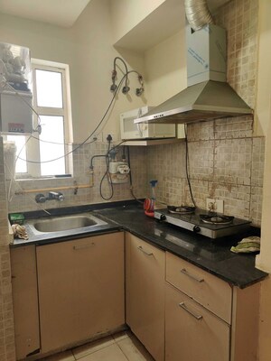 Kitchen in 1 BHK Apartment at Paras Tierea Studio Apartments, Sector 137 – for Rent