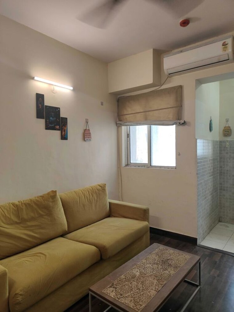 Living Room, paras-tierea-studio-apartments 1 Bedroom 495 Sq.Ft. Apartment In Sector 137 Noida 10425269