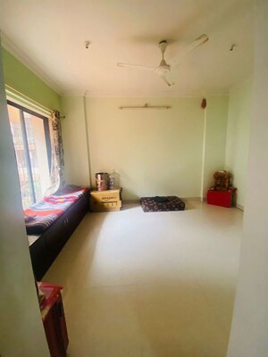 Living Room in 1 BHK Apartment at Royal Palms, Goregaon East – for Sale