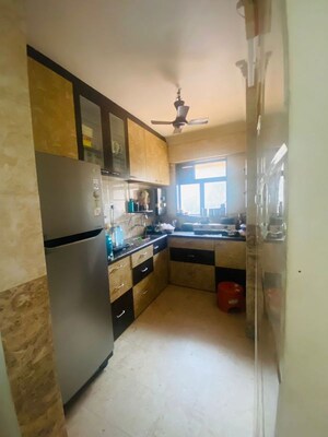 Kitchen in 1 BHK Apartment at Royal Palms, Goregaon East – for Sale