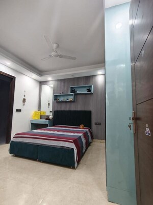 Bedroom in 4 BHK Builder Floor at Freedom Fighters Enclave – for Sale