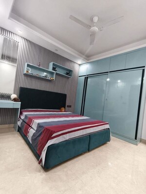 Bedroom in 4 BHK Builder Floor at Freedom Fighters Enclave – for Sale
