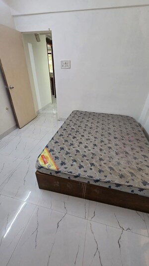 Bedroom in 2 BHK Apartment at Kopar Khairane – for Rent