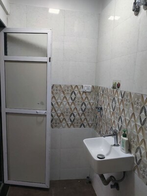 Bathroom in 3 BHK Apartment at Riddhi Garden, Malad East – for Rent
