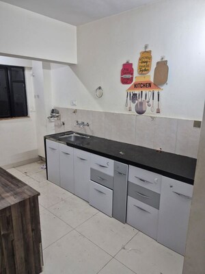 Kitchen in 2 BHK Apartment at Wadgaon Sheri – for Rent