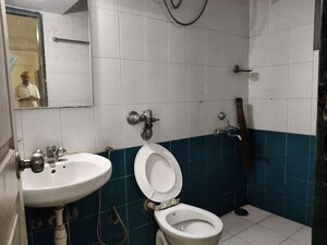 Bathroom in 1 BHK Apartment at Hiranandani Estate Flora, Ghodbunder Road – for Rent