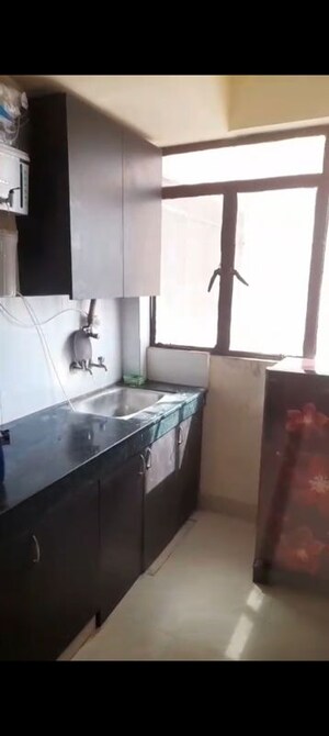 Kitchen in 2 BHK Apartment at Signature Global Orchard Avenue, Sector 93 – for Sale