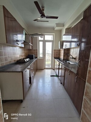 Kitchen in 3 BHK Apartment at Aims Golf Avenue I, Sector 75 – for Rent