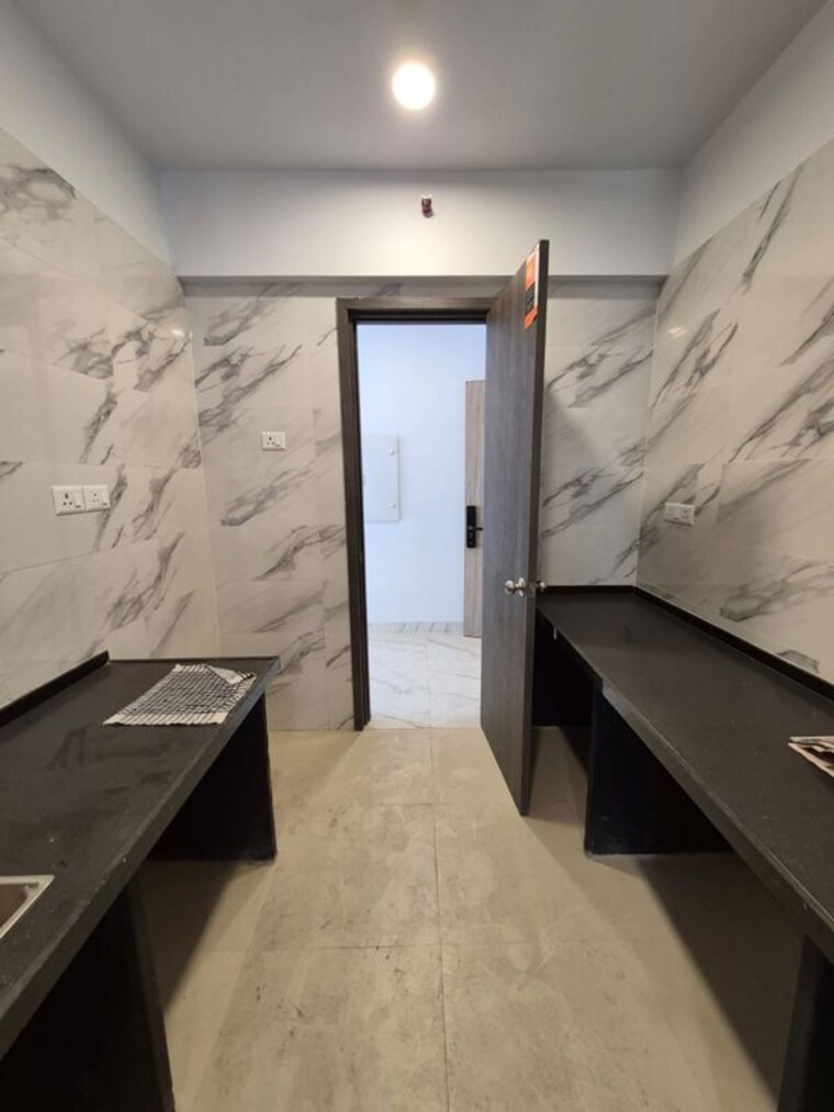 Kitchen, risland-the-icon-phase-4 2 Bedroom 775 Sq.Ft. Apartment In Dhokali Thane 10425634
