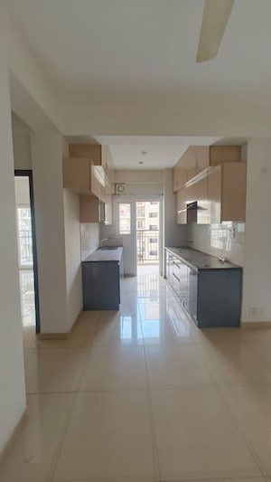 Kitchen in 2.5 BHK Apartment at Gulshan Botnia, Sector 144 – for Rent