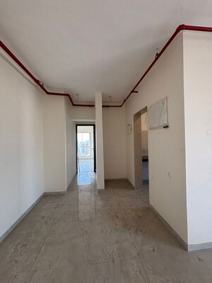 Room in 2 BHK Apartment at IM Applaud 38, Goregaon East – for Rent
