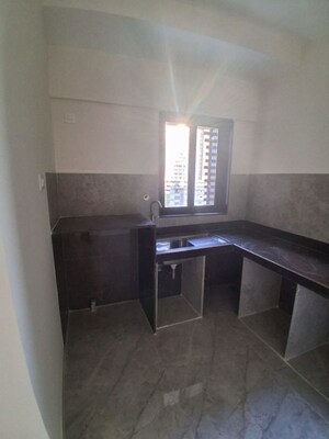 Kitchen in 2 BHK Apartment at Ajmera Boulevard, Malad West – for Rent
