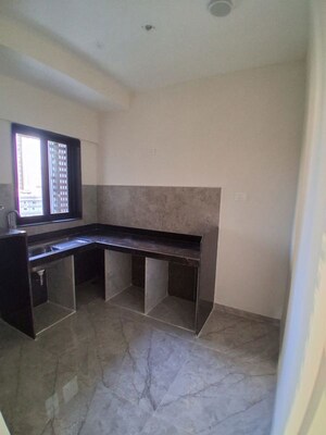 Kitchen in 2 BHK Apartment at Ajmera Boulevard, Malad West – for Rent