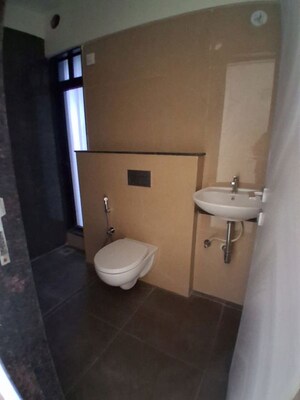 Bathroom in 2 BHK Apartment at Ajmera Boulevard, Malad West – for Rent