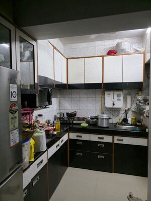 Kitchen in 2 BHK Apartment at Shree Ashtavinayak CHS Andheri, Andheri West – for Rent