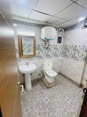 Bathroom in 3 BHK Apartment at Saya Gold Avenue, Vaibhav Khand – for Sale