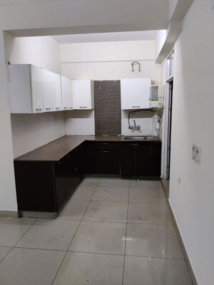 Kitchen in 2 BHK Apartment at Exotica Dreamville, Sector 16c Greater Noida – for Rent