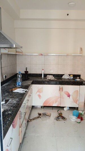 Kitchen in 4 BHK Apartment at Mahindra Aura, Sector 110a – for Rent