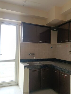Kitchen in 4 BHK Apartment at Mahindra Aura, Sector 110a – for Rent