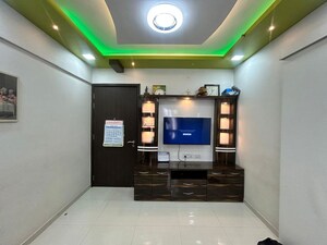 Living Room in 2 BHK Apartment at Shree Tirupati STG Signature Residency, Patlipada – for Rent