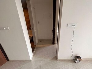 Building Lobby in 1 BHK Apartment at Lodha Quality Home Tower 2, Majiwada – for Rent