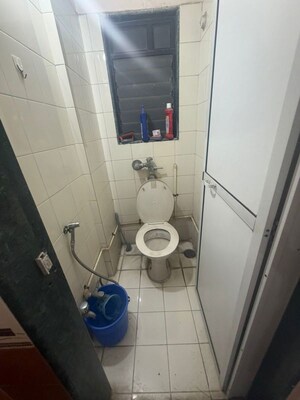 Bathroom in 1 BHK Apartment at Puraniks Kavya Dhara CHS, Dhokali – for Rent