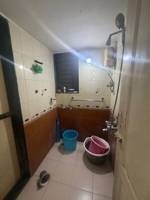 Bathroom in 1 BHK Apartment at Puraniks Kavya Dhara CHS, Dhokali – for Rent