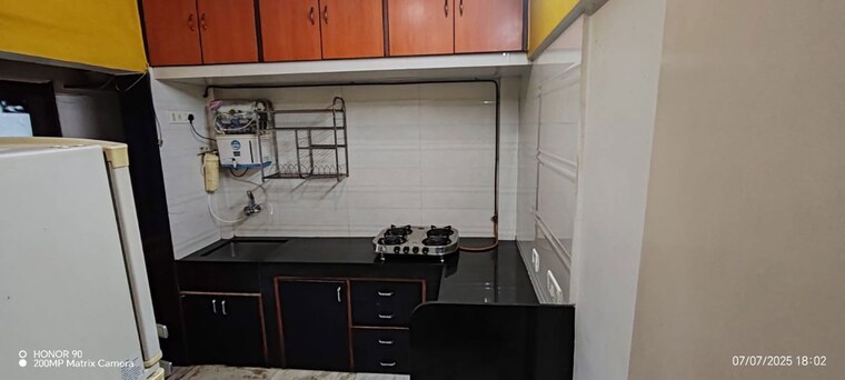 Kitchen, himgiri-lokupvan-phase-ii-chs-ltd 2 Bedroom 750 Sq.Ft. Apartment In Vasant Vihar Thane 10426301