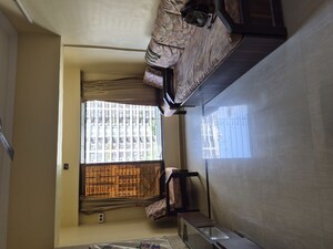 Living Room in 2 BHK Apartment at Kamal Van CHS, Kandivali West – for Rent
