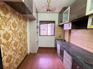 Kitchen in 2 BHK Apartment at Sudarshan Sky Garden, Ghodbunder Road – for Rent