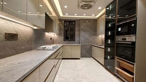 Kitchen in 4 BHK Builder Floor at Sushant Lok I – for Sale