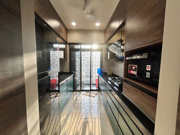Kitchen, lodha-splendora-tierra 2 Bedroom 700 Sq.Ft. Apartment In Ghodbunder Road Thane 10426409