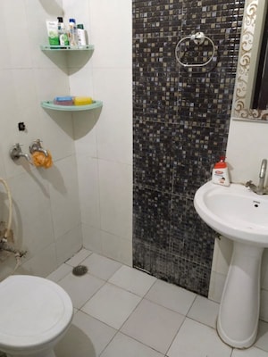 Bathroom in 3 BHK Apartment at Sushma Valencia, International Airport Road – for Rent