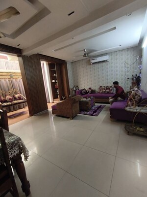 Living Room in 4 BHK Apartment at Sushma Elite Cross, Dhakoli – for Rent