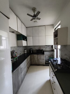 Kitchen in 4 BHK Apartment at Sushma Elite Cross, Dhakoli – for Rent