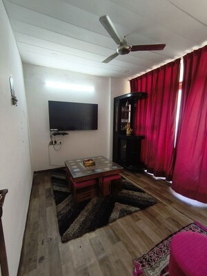 Living Room in 4 BHK Apartment at Sushma Elite Cross, Dhakoli – for Rent