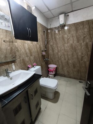 Bathroom in 4 BHK Apartment at Sushma Elite Cross, Dhakoli – for Rent