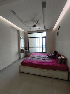 Bedroom in 4 BHK Apartment at Sushma Elite Cross, Dhakoli – for Rent