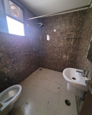Bathroom in 4 BHK Builder Floor at Green Fields Colony – for Rent