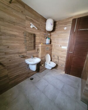 Bathroom in 4 BHK Builder Floor at Green Fields Colony – for Rent