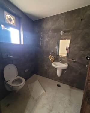 Bathroom in 4 BHK Builder Floor at Green Fields Colony – for Rent