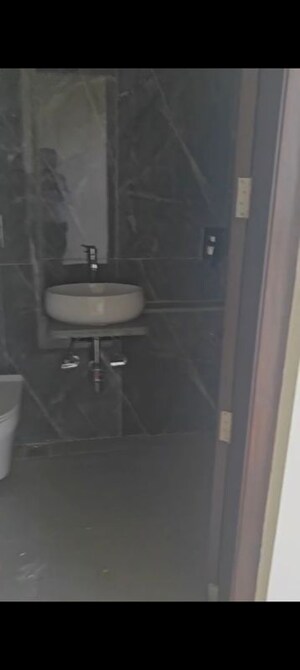 Bathroom in 3 BHK Apartment at Ruparel Ariana, Parel – for Sale