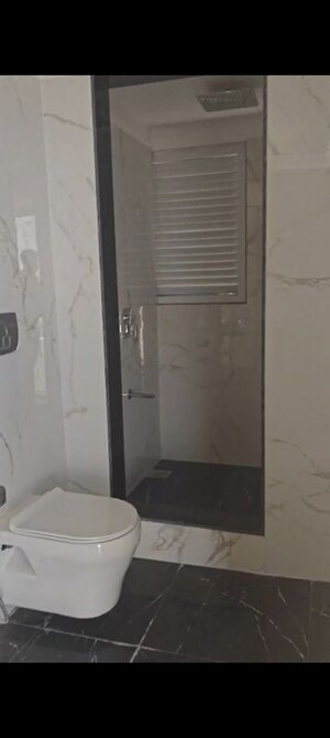 Bathroom in 3 BHK Apartment at Ruparel Ariana, Parel – for Sale