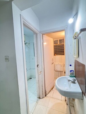 Bathroom in 2 BHK Apartment at BK Jhala Kapil Woodrow Estate Phase 2, Wanwadi – for Rent