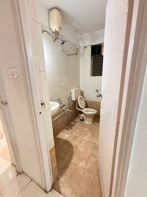 Bathroom in 2 BHK Apartment at BK Jhala Kapil Woodrow Estate Phase 2, Wanwadi – for Rent
