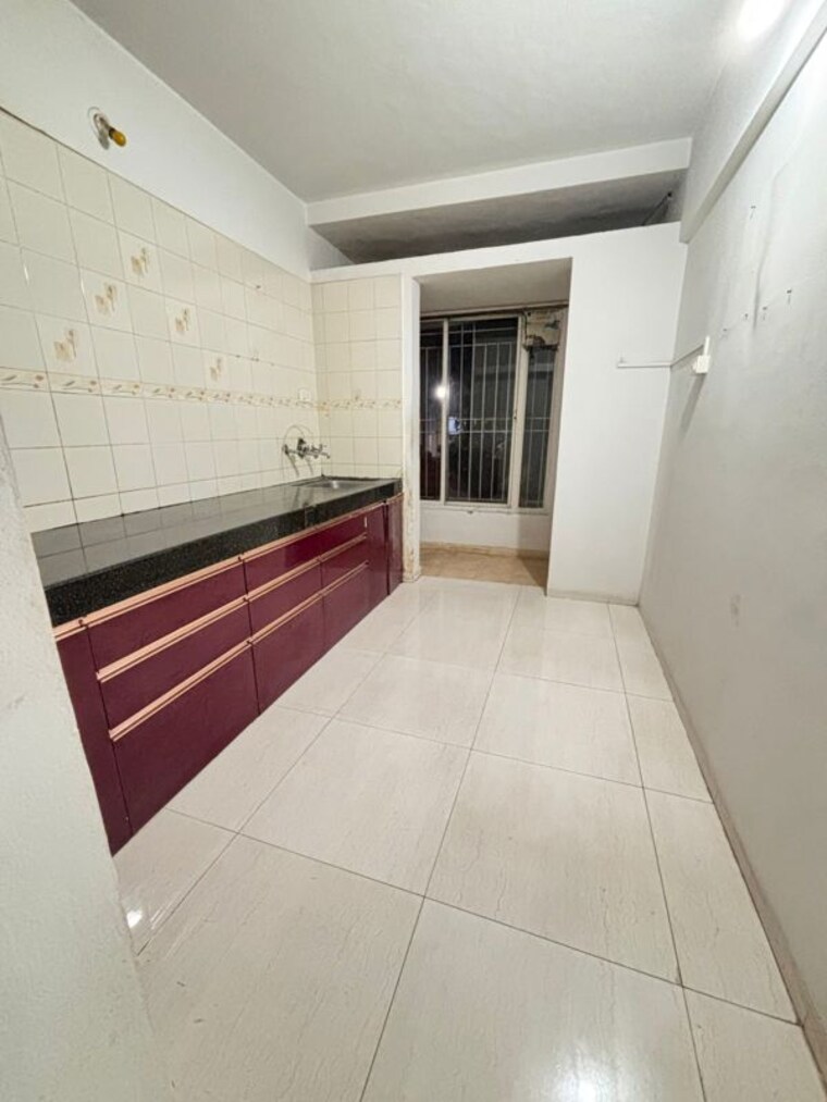 Kitchen, bk-jhala-kapil-woodrow-estate-phase-2 2 Bedroom 1050 Sq.Ft. Apartment In Wanwadi Pune 10426596