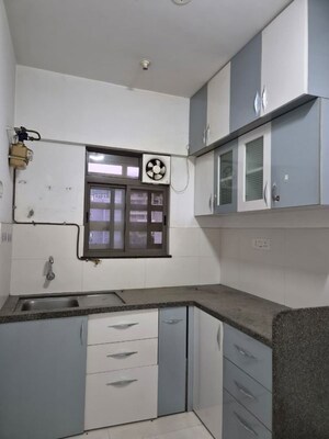 Kitchen in 2 BHK Apartment at Kumar Padmalaya, Aundh – for Rent