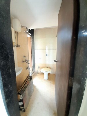 Bathroom in 1 BHK Apartment at Coral Heights, Kavesar – for Sale