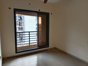 Bedroom in 2 BHK Apartment at Galaxy Carina, Kharghar – for Rent